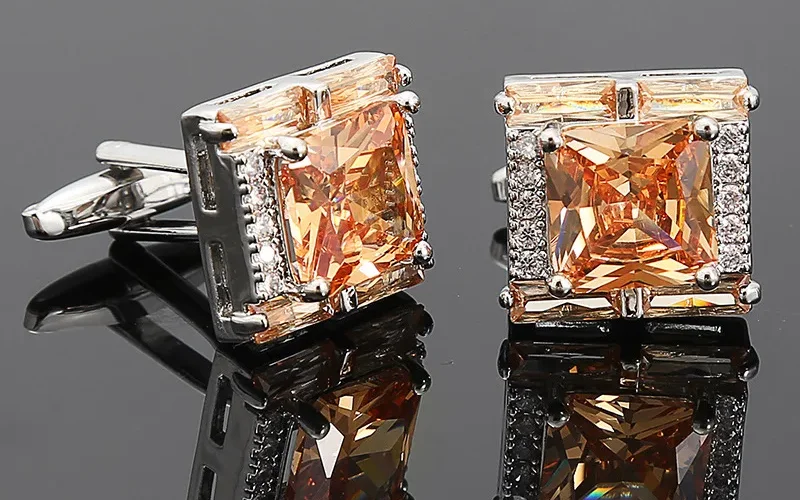 French toggle mechanism detail showing back structure with multi-color variants displayed and business wear on wrist