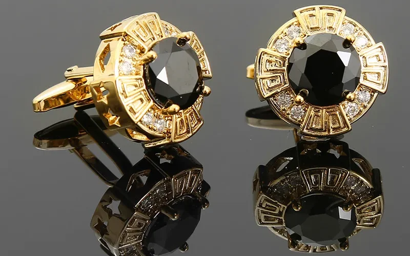 Side-profile view of butterfly clasp mechanism in open and closed positions