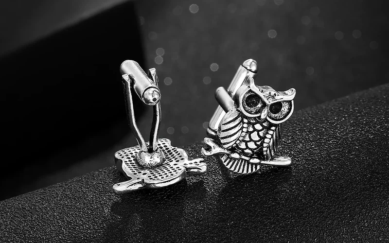 Product display in open gift box, complete cufflink showcase with textured box background